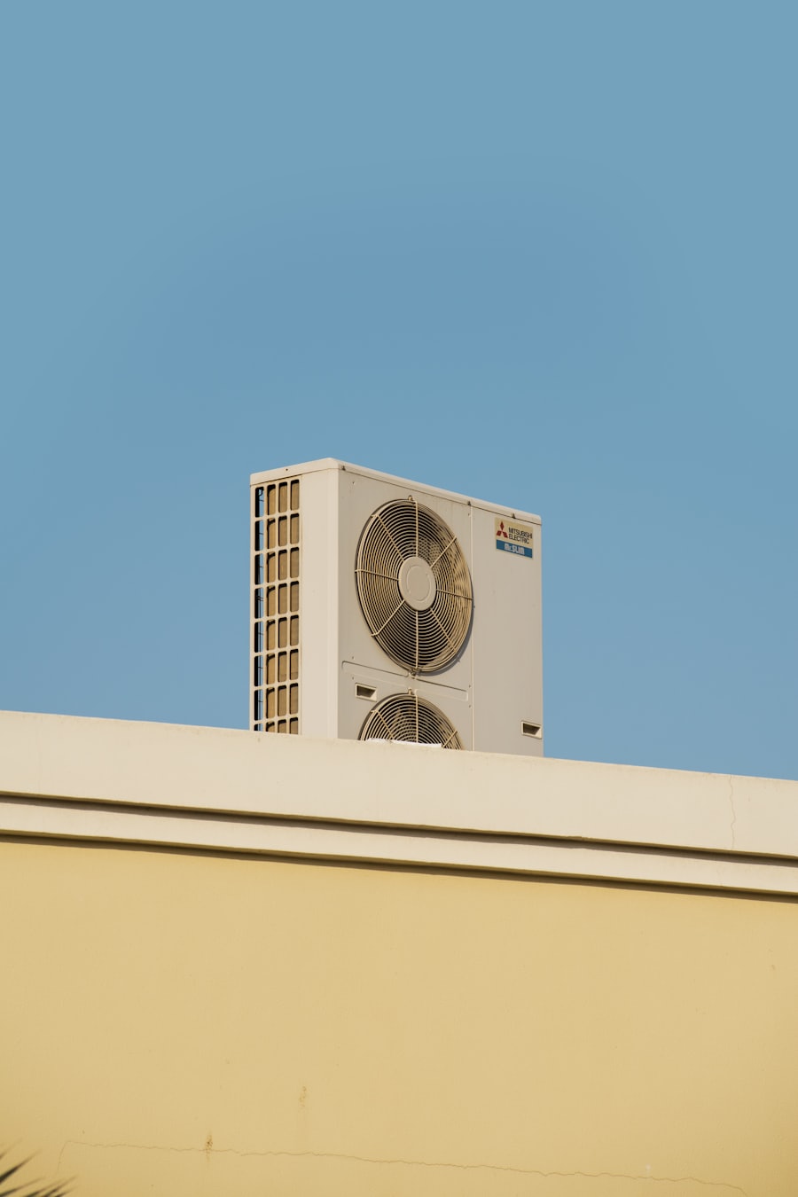 Rooftop air-conditioning condenser unit against a clear sky